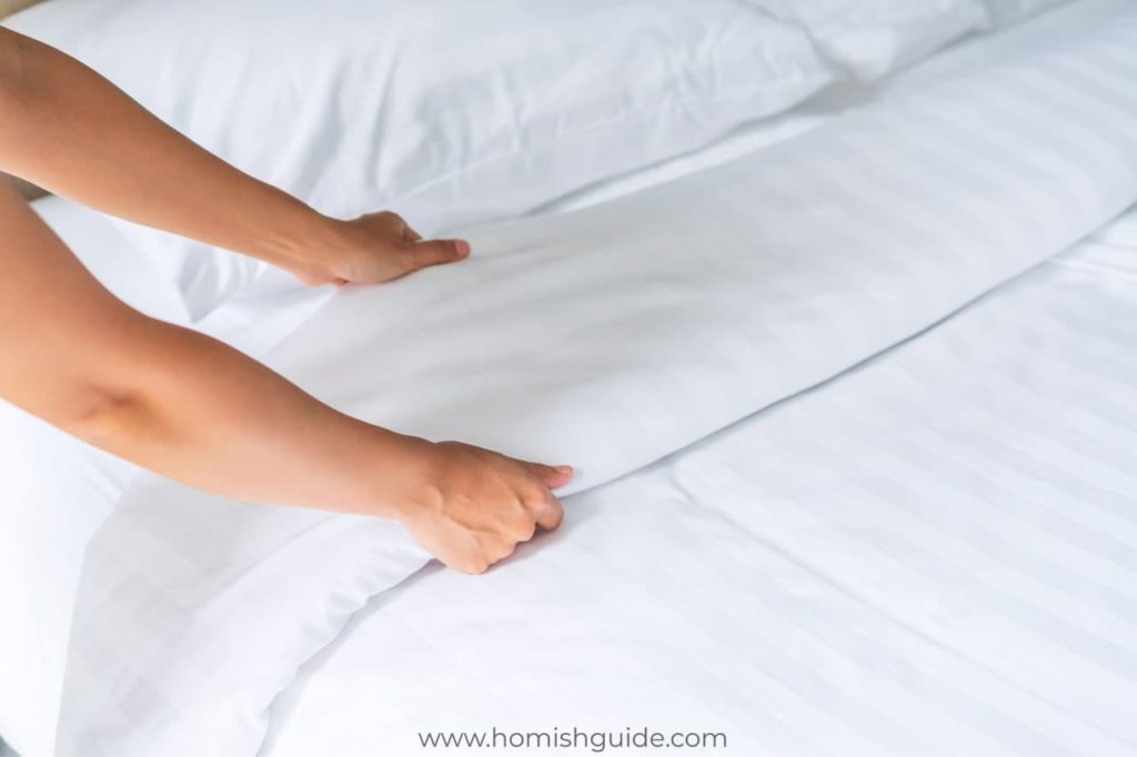 put on a mattress cover Mattress Protectors